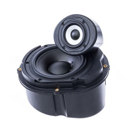 A coaxial speaker module, its tweeter hinged above the bass driver on a sealed enclosure.