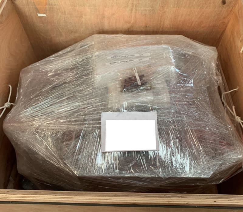 The completed tool shrink wrapped and crated for shipment.